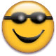 Улыбка Смайлик в очках улыбается и шлет воздушный поцелуй аватар