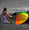 Дети Девочка с разноцветным зонтиком на пляже аватар
