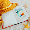 Книги, библиотека Шляпка, ракушка и книга на белом песке аватар