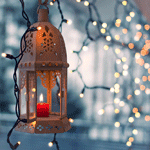 Салют, свечи, фонари Свеча в подсвечнике красиво горит в окружнении гирлянд аватар